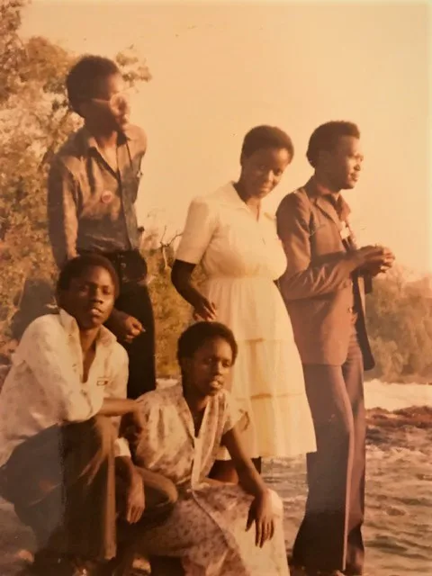 Abel relaxing with friends by the Zambezi River during the 1980 population census